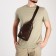 Male sling bag, artificial leather, headphone opening, brown color