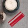 A ruler for determining the size of the KnitPro spokes, a rectangular red 10701