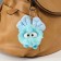 Fluffy on the ring "Masya with a large bow" Blue 12x8x8 cm