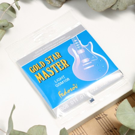 The strings of Gold Star Master Light (.008 -.038, hung - stainless steel.