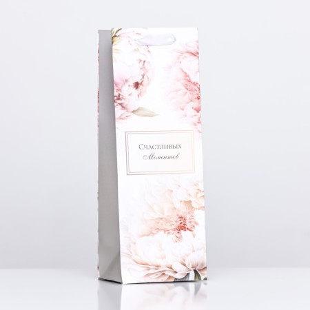 Package laminated for a bottle of "happy moments", 13 x 36 x 10 cm