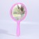 A mirror with a handle, bilateral, with an increase, D mirror surface 12.5 cm, pink color