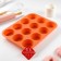 Baking uniform “Circles”, silicone, 12 cells, 33 × 25 × 2.6 cm, d = 7 cm, orange color