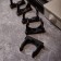 Fastener-clip for the mounting gun Ø 40 mm, black (25 pcs/UP) rexant