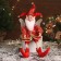 New Year's jester "with wings" sits, moves, 39x14 cm, red