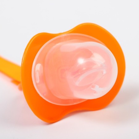 Silicone orthodontic dummy with a holder and cap, from 0 months, color orange-4