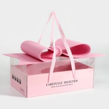 Gift box with a bow, handles and a transparent lid 35 x 21 x 15 cm pink