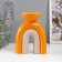Ceramics candlestick for 1 candle "Medusa" sand-orange 13.5x8.7x18 cm