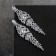 Hanging earrings with rhinestones "openwork" ice, white color in silver, 8.3 cm