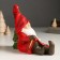 Souvenir Polystone Light "Santa Claus in a red outfit sits at the Christmas tree" 14x7x18 cm