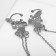 Earrings "Kuffs" butterfly wings, white color in silver