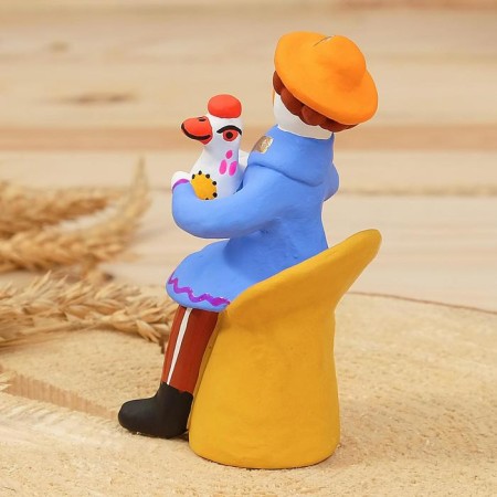 Dymkovo toy "Sitting man with a rooster", 11 cm, mix-1