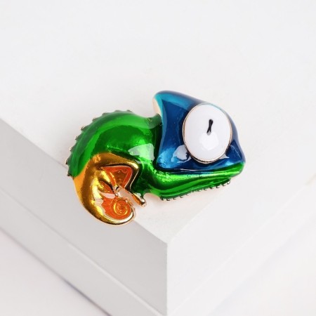 A brooch "Chameleon", the color is blue-green with gold in gold