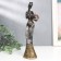 Polystone souvenir "African with a jug, in a dress with silver flowers" mix 25.5x7x5 cm