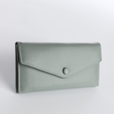 Women's wallet on the button, green color
