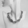 The necklace "chain" is double, tourniquet, silver color, 40 cm