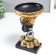 Souvenir Polystone stand "African in a golden device, with earrings in the ears" 25x15x15 cm