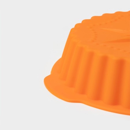 The form for baking is the “corrugated circle. Star ", silicone, d = 20 cm, with handles, color mix-3