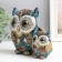 Polystone souvenir "Eagle owl with a hood, blue-red snowflakes" sparkles 16.5x8x16 cm