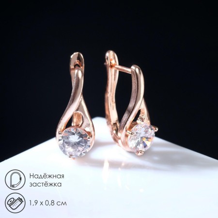 Earrings with rhinestones "Magic" bead in a drop, the color is white in pink gold