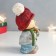 Souvenir Polystone "Boy in a red cap with a deer in his hands" 10x8.5x16 cm
