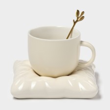 Tea couple ceramic with a spoon 