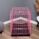 A cage with a hatch for dogs and cats, 100 x 60 x 70 cm, pink