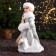 Snow Maiden "In a clutch with fur bombs" 43 cm, silver-white