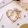 Brooch "Heart" in berries, white color in gold