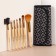 A set of makeup brushes "Ornament", 7 objects, a cover on a button, black/beige color