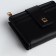 Women's wallet on the button, black color