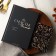 A book for recording recipes and a notebook list of purchases “Happiness is”.