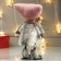 Interior doll "Girl in a pink hat with ears and white fur coat" 27x10x17 cm