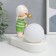 Souvenir Polystone Light "Baby in a white cap, with a gold bubble at the ball" 16.5x8x16 cm