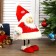 Interior doll "Grandfather Frost in red caftan and cap with snowflakes" 44x21x31 cm