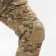 The costume is tactical, with inserts on the elbows and knees, cartoons, l