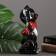 The piggy bank "Small cat with a rose" black, 20cm