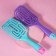 The comb is massage, wide, ventilated, 8 × 24.5 cm, color mix