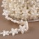 Pearls on threads, flat, “flowers”, 15 mm, 9 ± 1 m, white color