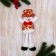 Soft suspension "Snowman in a shiny suit, long legs" 8x26 cm, red