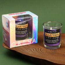 New Year's candle in a glass 