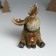Souvenir Polystone "Losik Smile in a spruce wreath with a bow and bell" sits 13.5x11x16 cm 10325