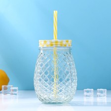 Glass jar with a lid and tube of the pineapple 
