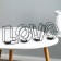 Summary of the metal desktop "Love", 13.5 x 42 cm, black