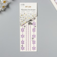 Sticker of rhinestone plastic tattoo on the body 