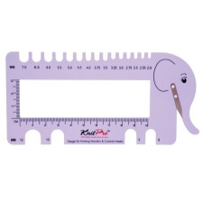 A ruler for determining the size of the knitting needles with a cutpro yarn, pale lilac 10995