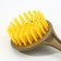 A dispenser for liquid soap with a sponge and a brush for dishes, white, 16 x 12 x 4 cm.