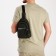 Male sling bag from textiles, headphones, green color
