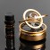 The accessory on the panel, gravitational rings, rotates from the sun, galaxy, gold