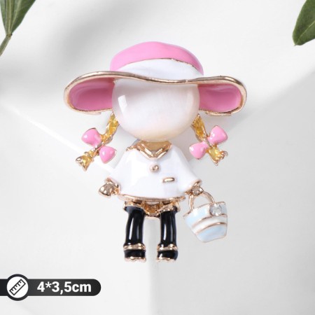 Brooch "Girl" in a hat, colored in gold